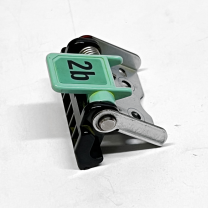 Decurler Transport Latch Assembly with green 2b  top cover release lever